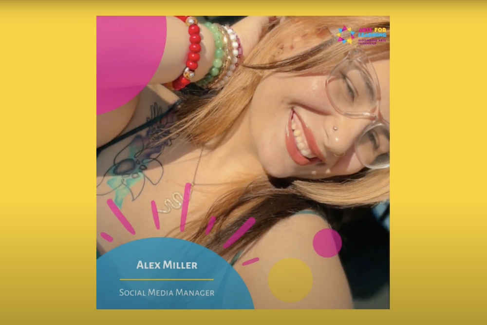 A selfie of Alexandra Miller, 2023 Bloomberg Arts Internship Social Media Manager. She has a bright smile and is wearing glasses and has an arm full of multi-colored beaded bracelets.