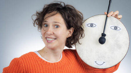 Natasha Mirny of Happy Theater with a drum