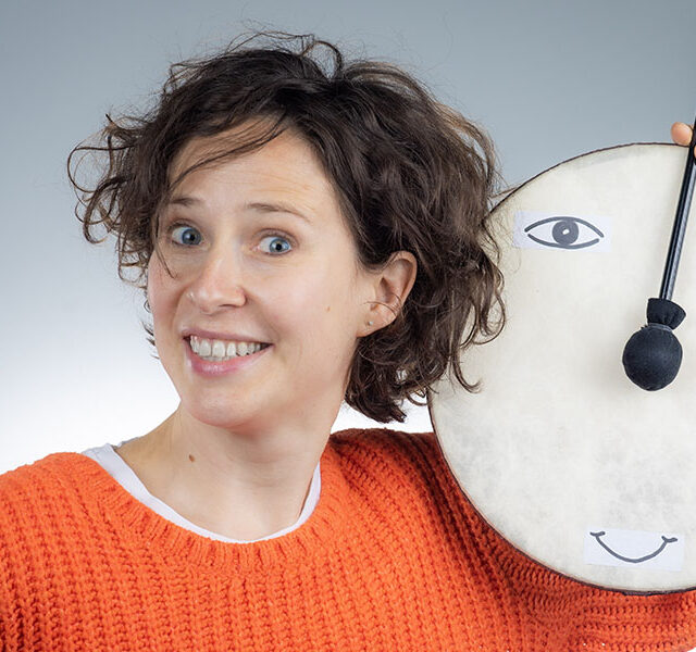 Natasha Mirny of Happy Theater with a drum