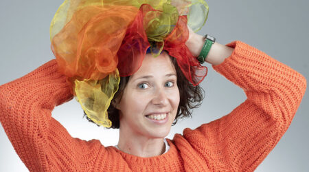 Natasha Mirny of Happy Theater with scarves