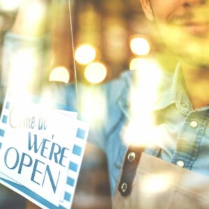 small businesses owner with open sign should prioritize rust prevention