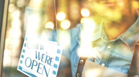 small businesses owner with open sign should prioritize rust prevention