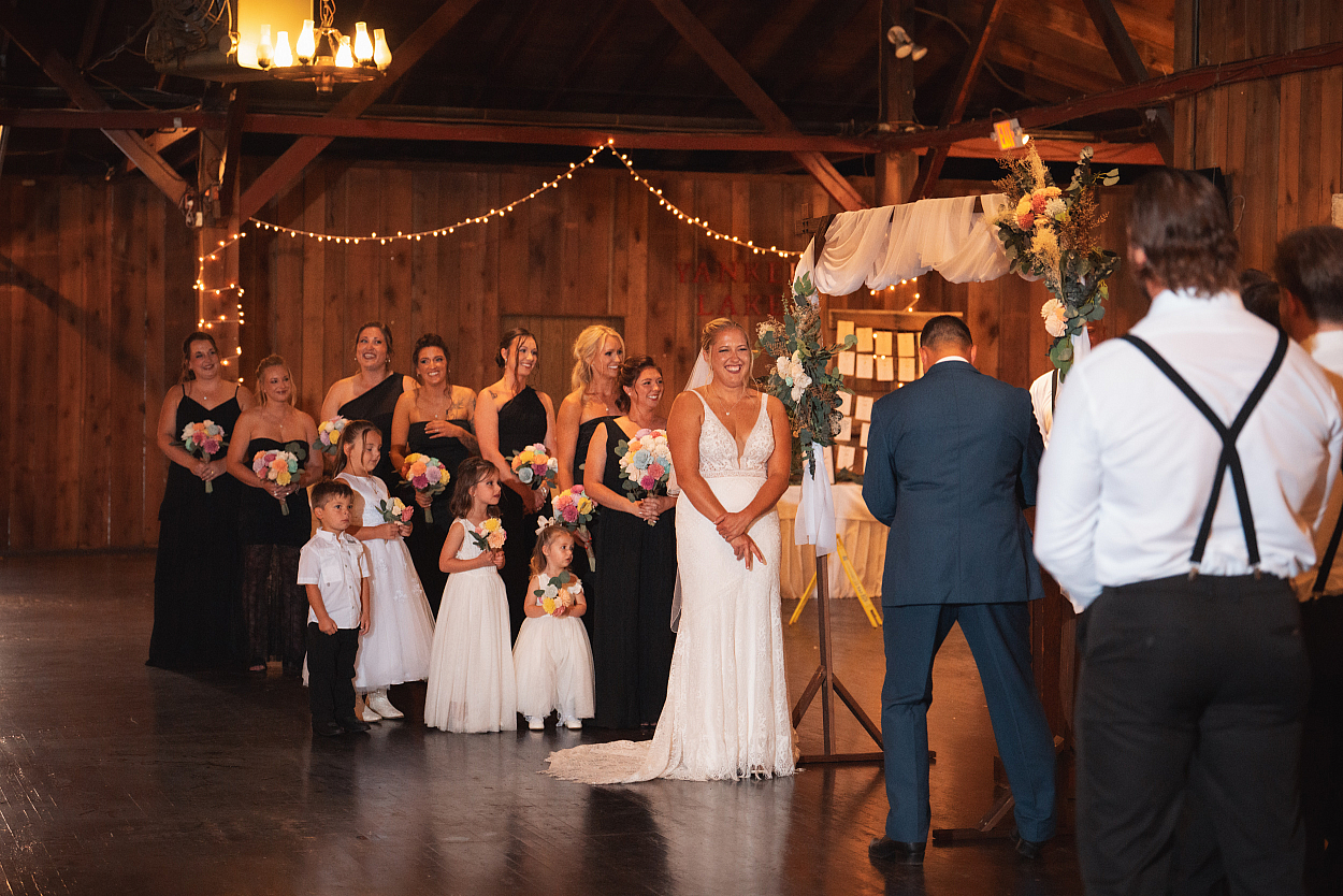 Wide view of a real wedding ceremony inside Yankee Lake Ballroom