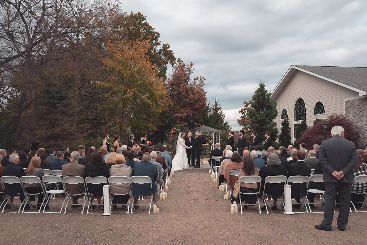 Wide outdoor wedding ceremony at Greystone Fields