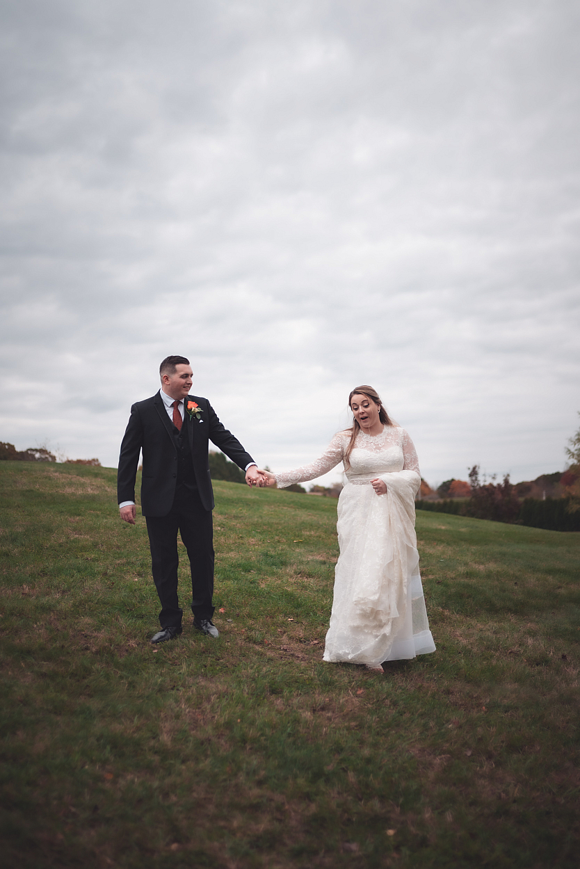 Couple portrait in the field at Greystone Fields