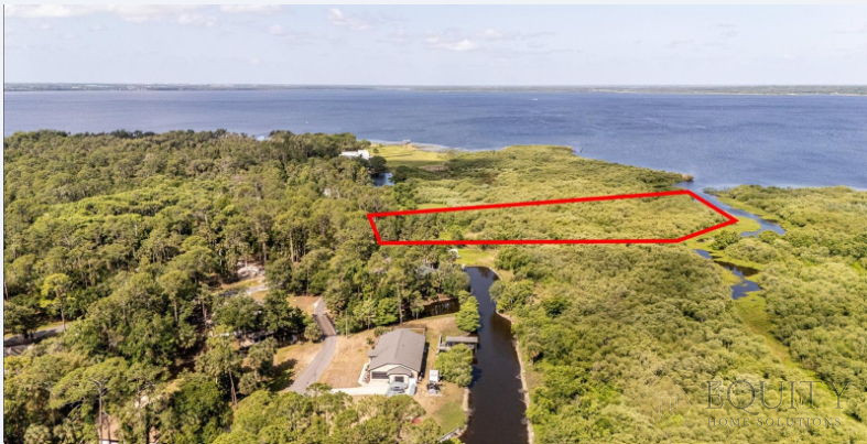🌊Rare Waterfront Acreage in Deltona – Prime 3.41-Acre Development Opportunity!👀
