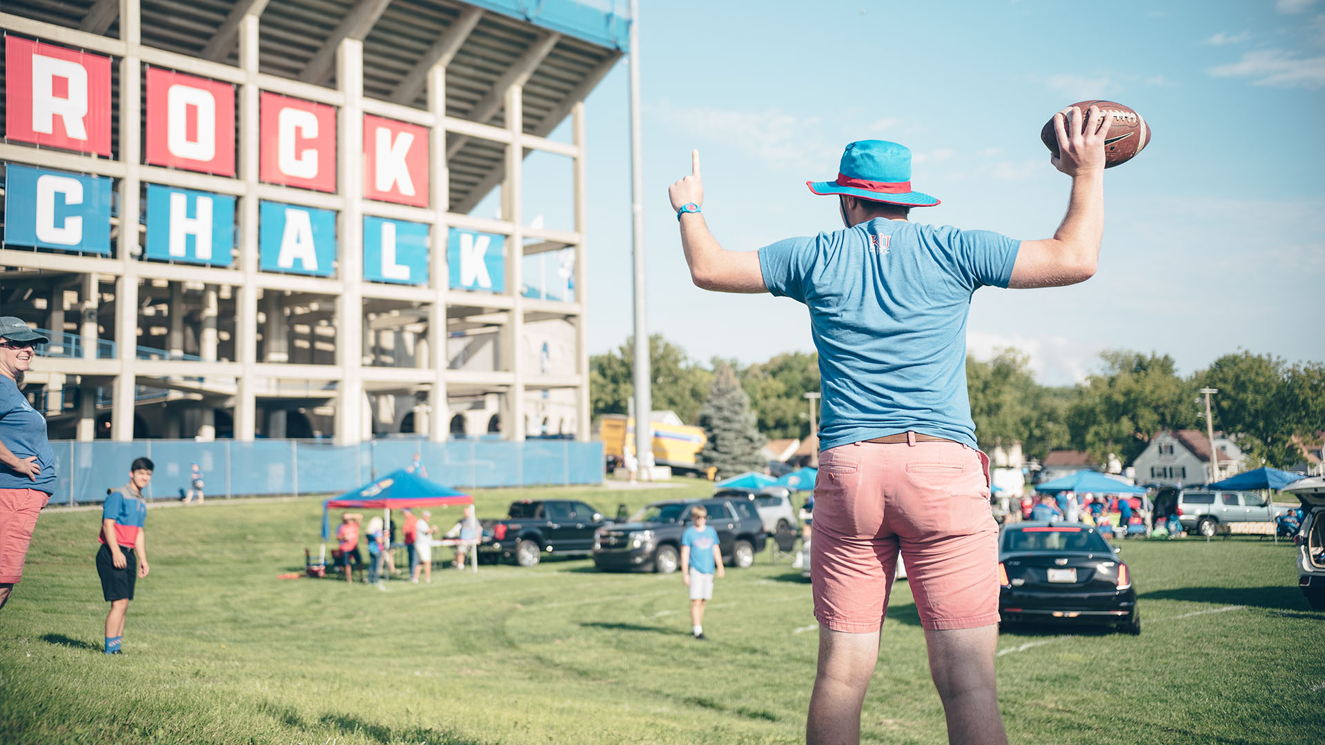 guy throws football tailgate indiana state