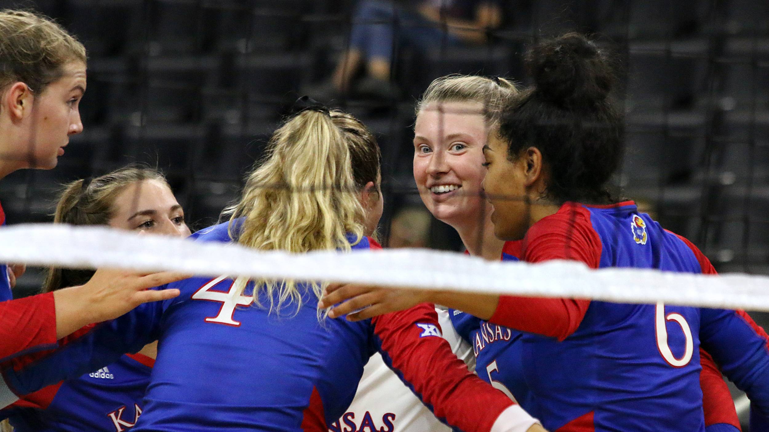 Gracie Van Driel celebrates with her teammates after a long rally.