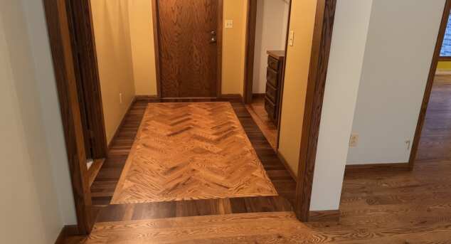 Custom Wood Flooring Pattern in Foyer