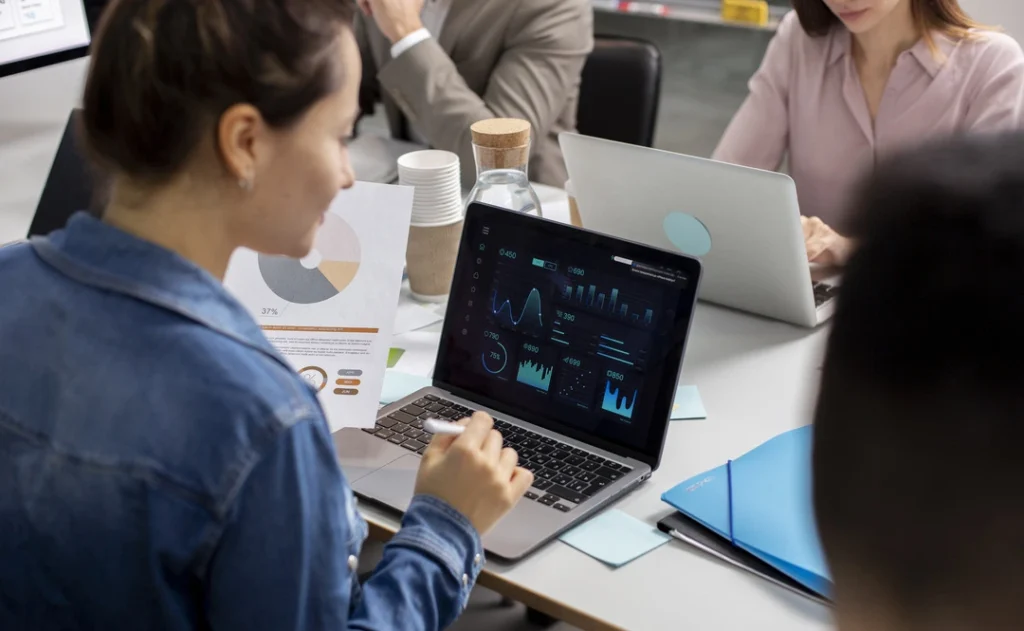 Workspace with data analysis charts, symbolizing smart automation use