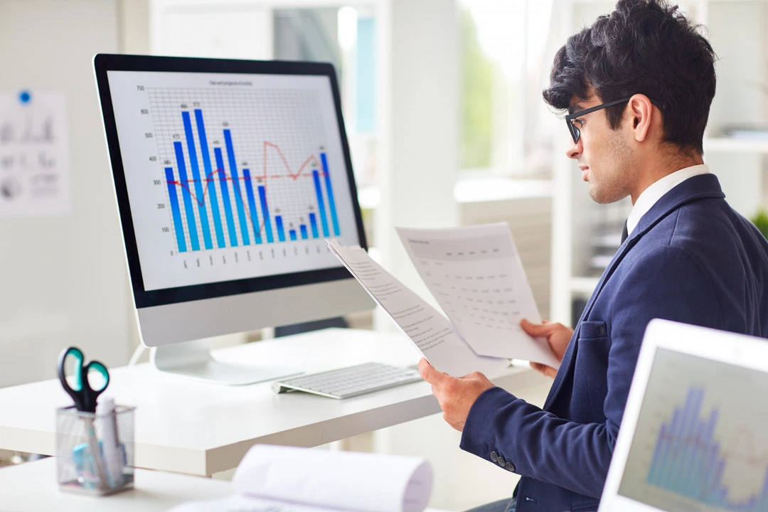 Focused individual gathering rental data insights using visual tools.