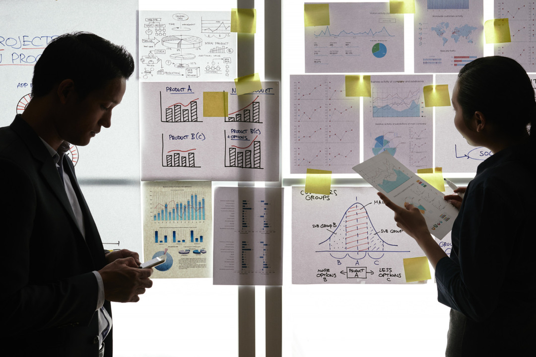 Reviewing competitor data during market research for a rental business.