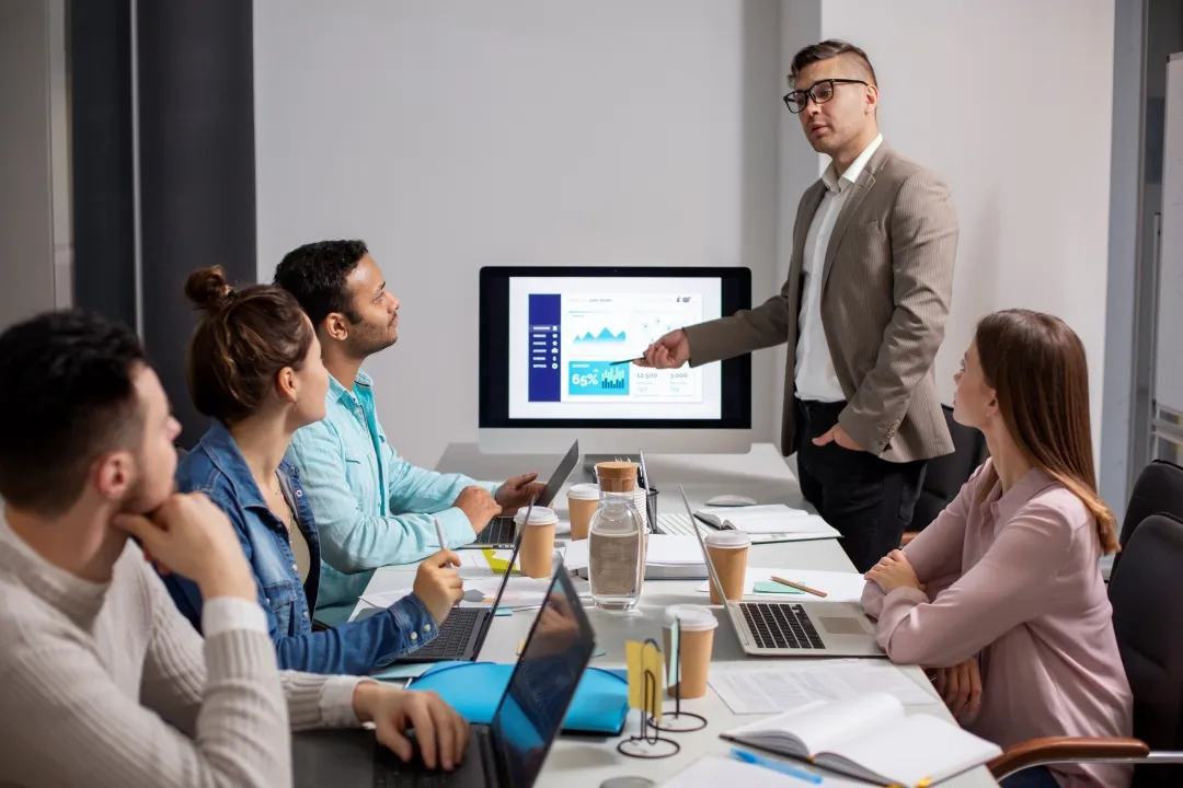 A marketing meeting for a kayak rental business