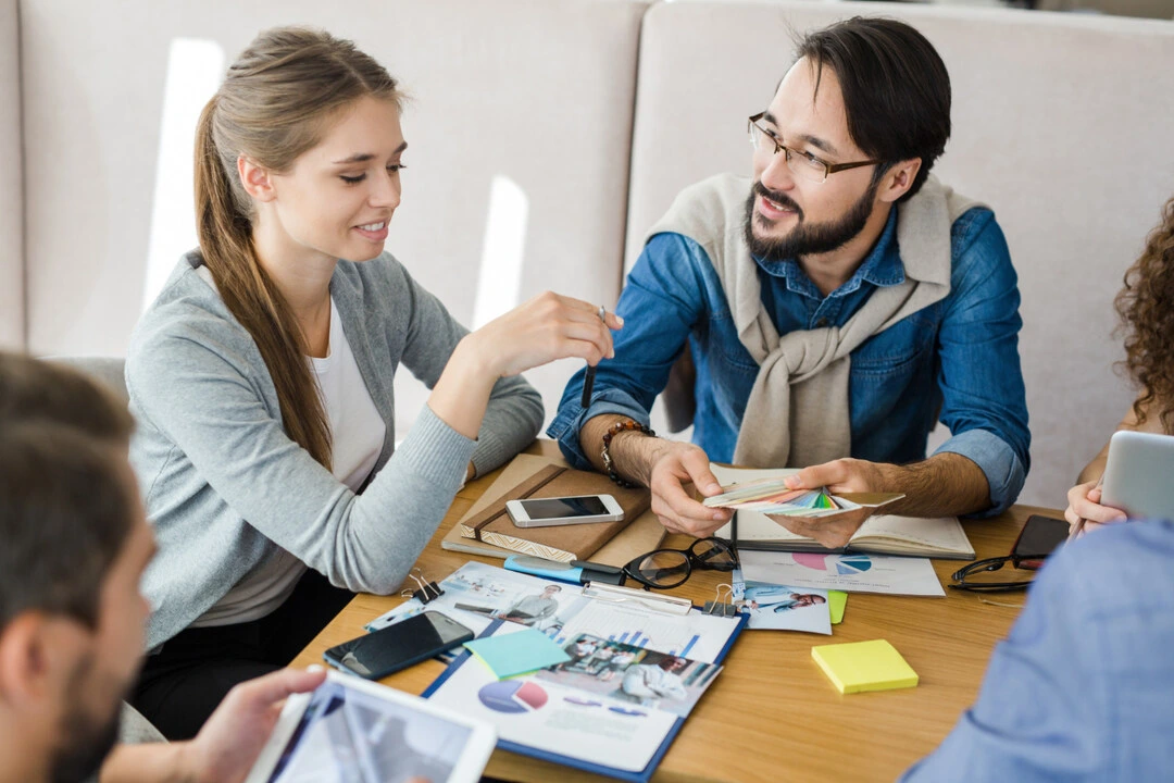 Crafting a business plan with financial projections at a planning meeting