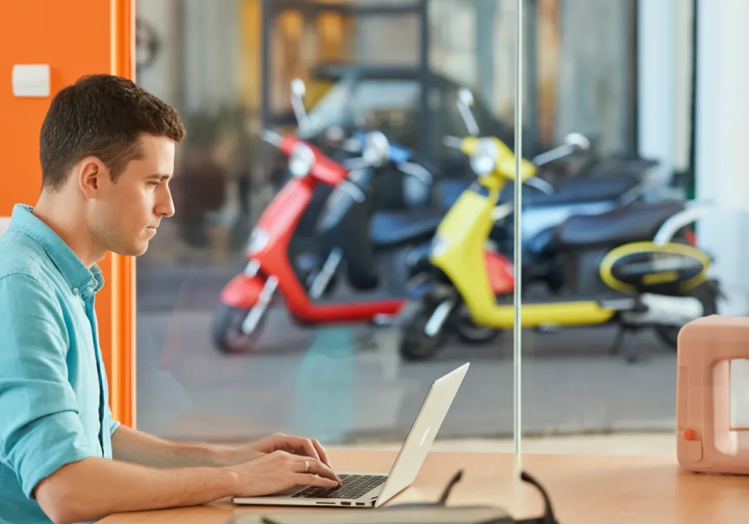 Operations management team overseeing scooter rental daily workflow