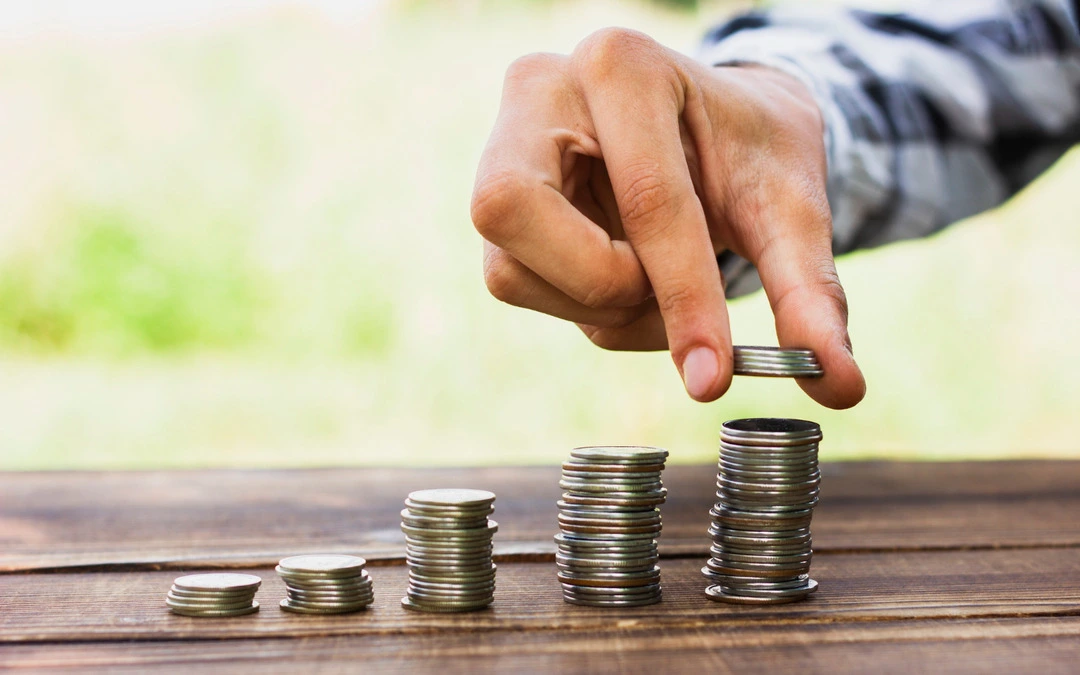 Coin stack representing pricing strategy for rental business