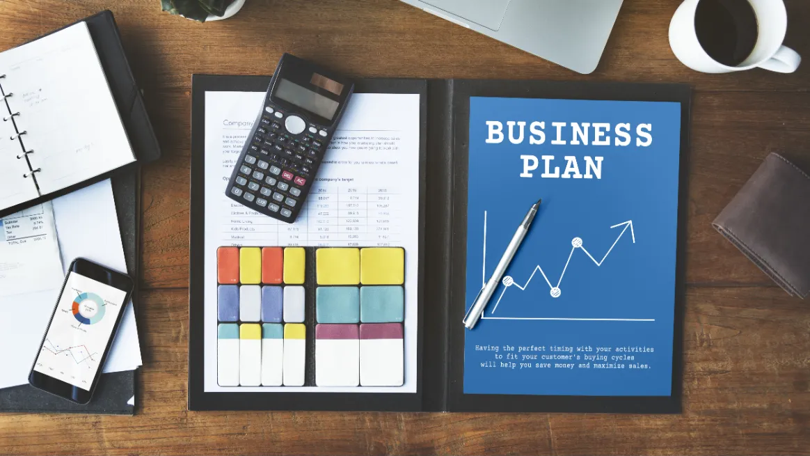 Tent rental funding strategy planning session with financial documents