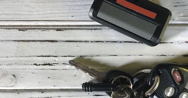 Keys and garage door opener on white background 2022 11 04 02 26 36 utc copy