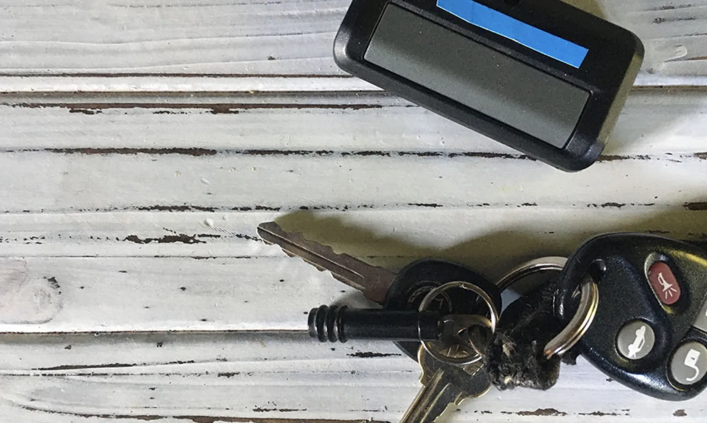 Keys and garage door opener on white background 2022 11 04 02 26 36 utc