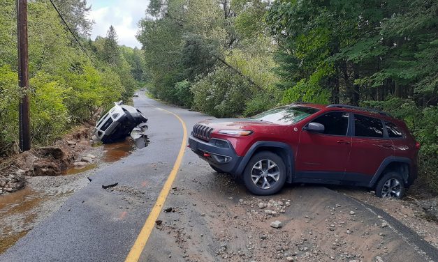 Woman rescued after being swept away in floodwaters in Harrington
