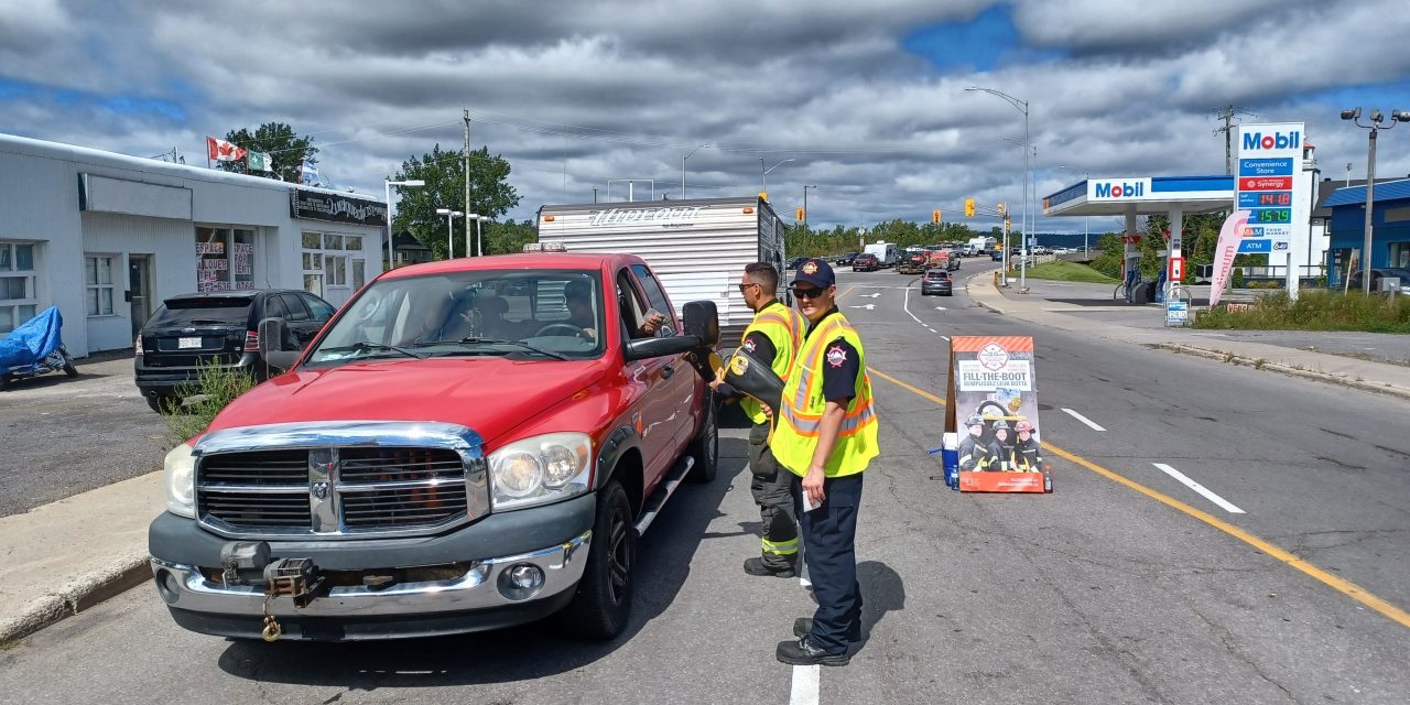Hawkesbury firefighters boot drive collects for muscular dystrophy