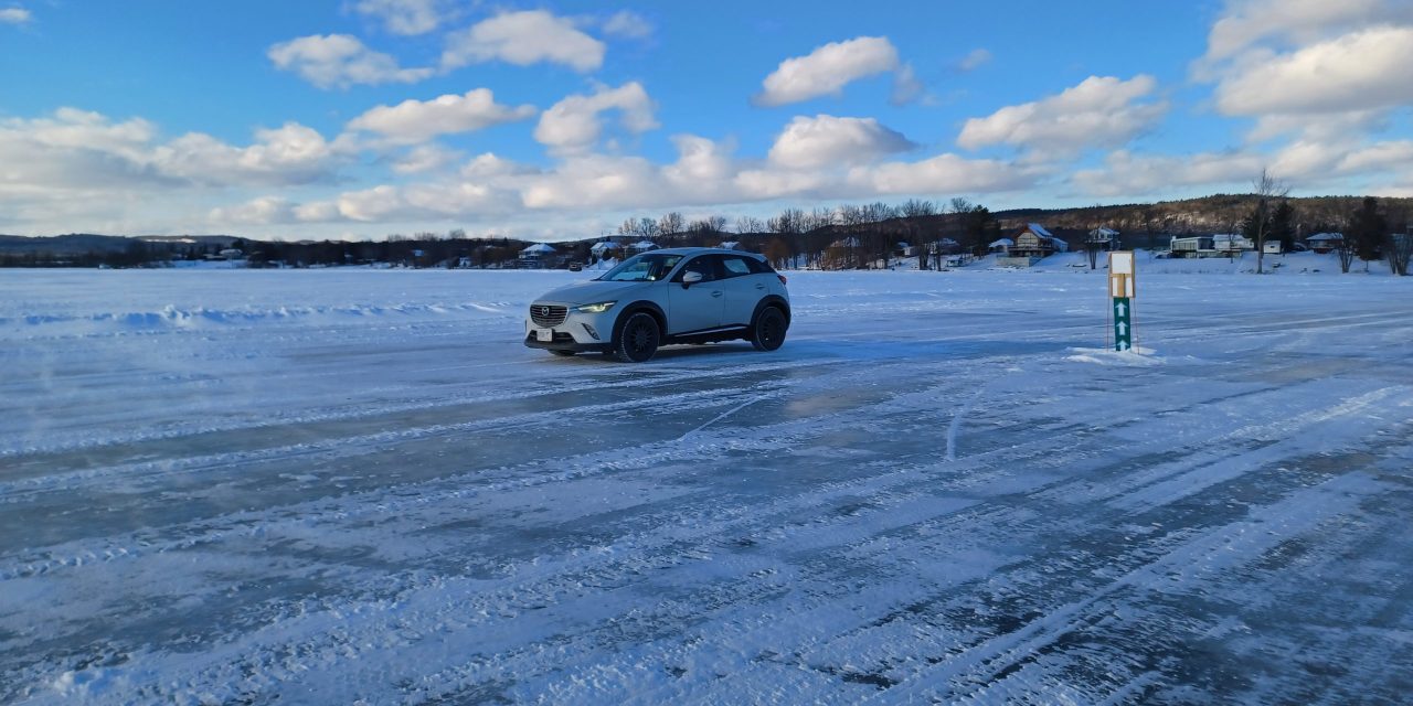 Traffic travels between Lefaivre and Fassett on ice