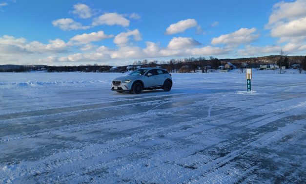 Traffic travels between Lefaivre and Fassett on ice