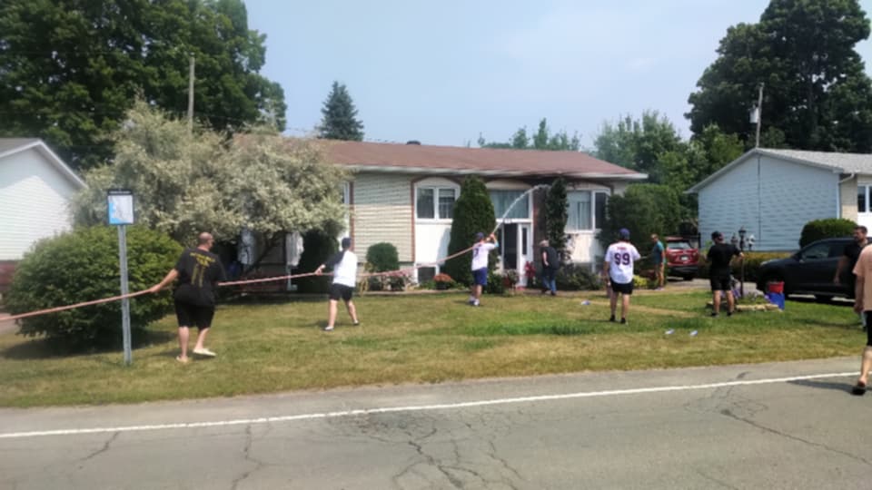 Baseball game takes break to fight fire in Grenville