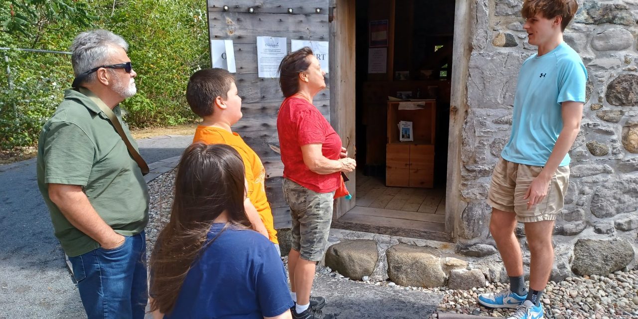 Welcoming tourists to the Higginson Tower