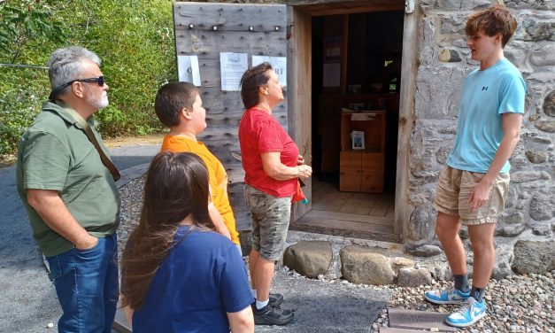 Welcoming tourists to the Higginson Tower