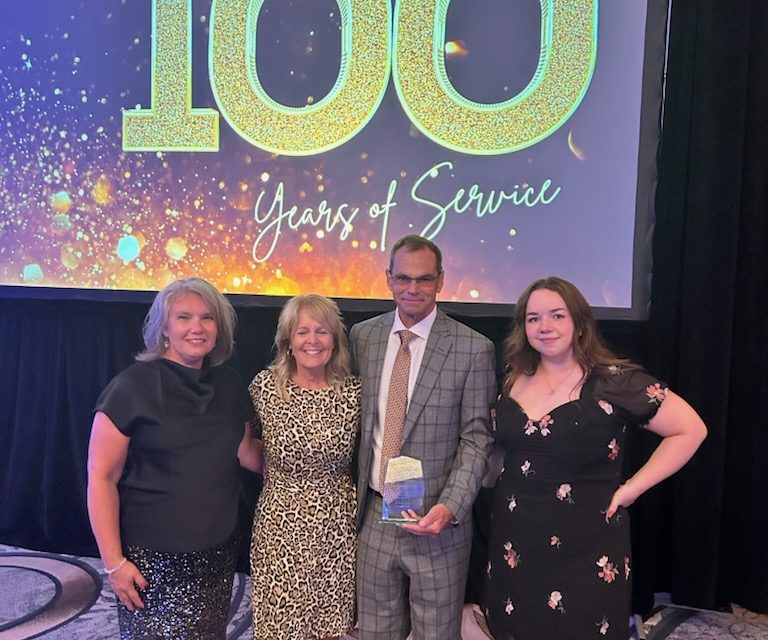 Mark Henderson receives award from provincial funeral association