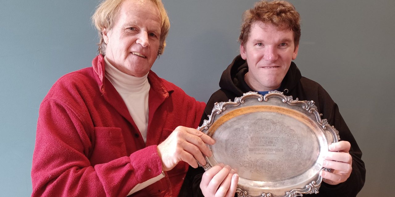 A special silver platter for Mac Hinton