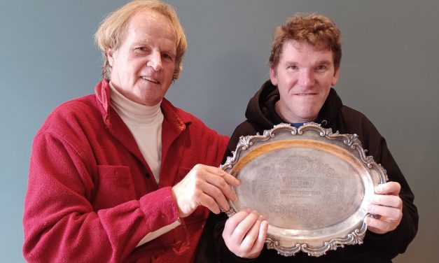 A special silver platter for Mac Hinton