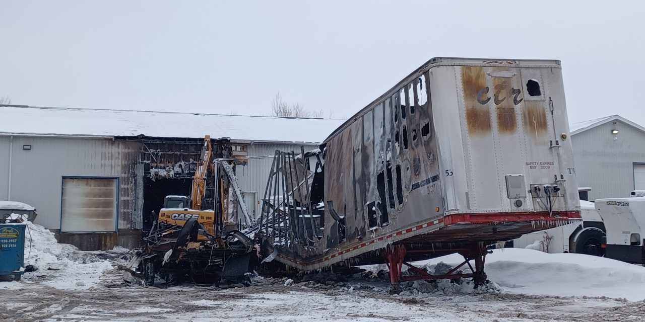 Fire at business warehouse on Highway 34