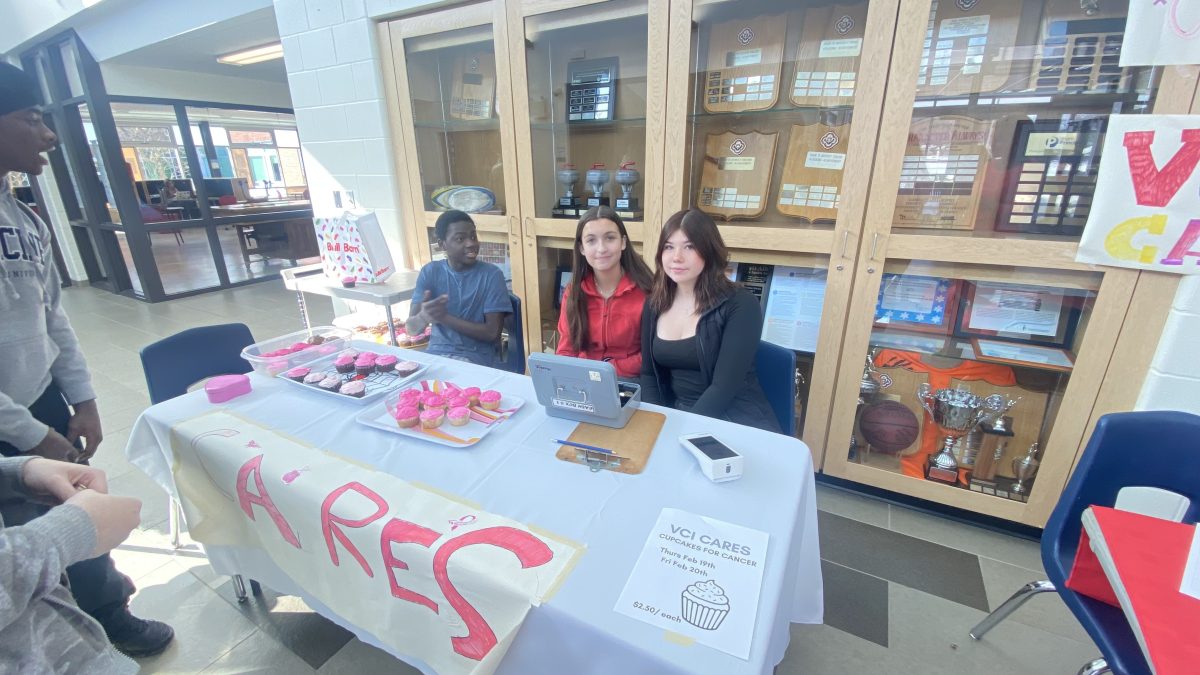 VCI business students raise funds for breast cancer research through cupcake sale