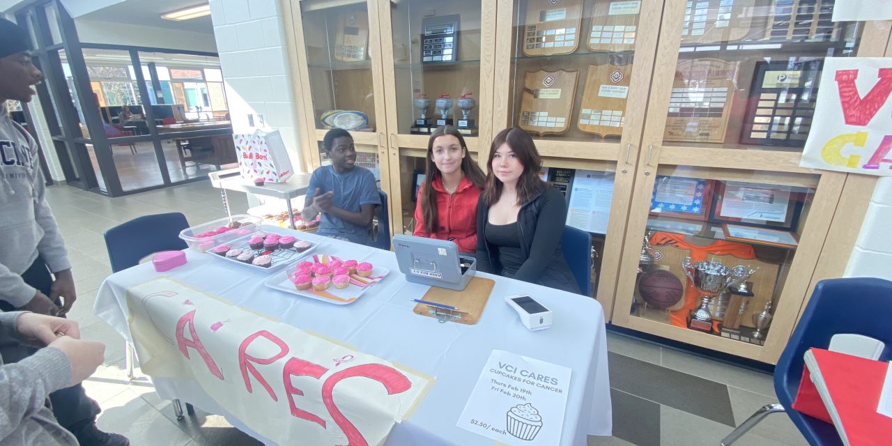 VCI business students raise funds for breast cancer research through cupcake sale