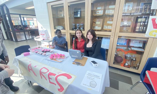 VCI business students raise funds for breast cancer research through cupcake sale