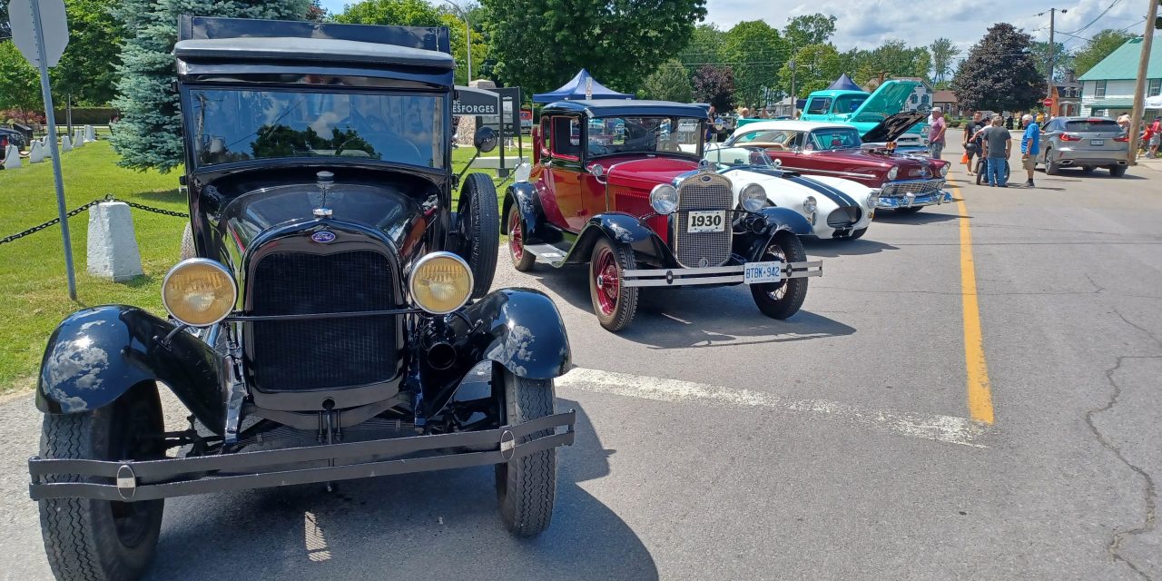 Classic cars by the canal in Grenville