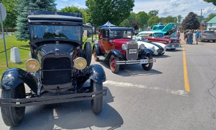 Classic cars by the canal in Grenville