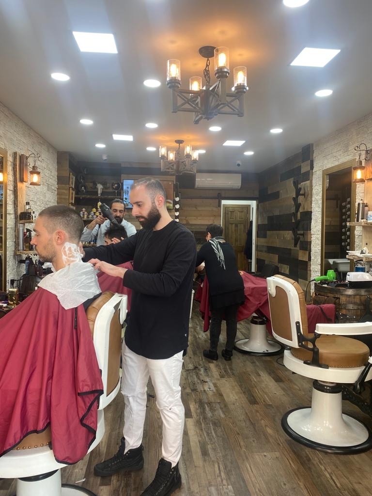 Are boar bristle brushes effective for distributing natural oils and promoting beard health?