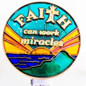 Nightlight featuring bright sunrise with the words "Faith Can Work Miracles"
