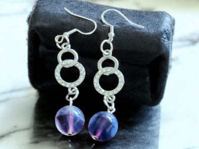 Purple marble effect cat eye glass beaded dangle earrings