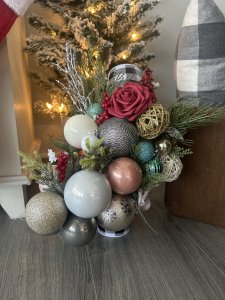 Buckets full of Christmas balls and flowers