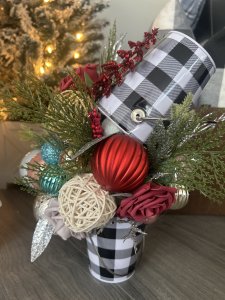 Buckets full of Christmas balls and flowers