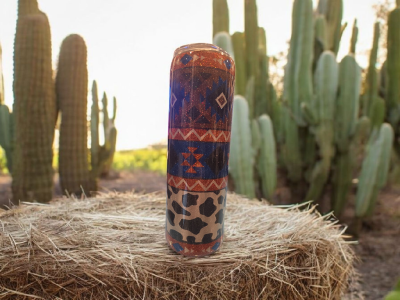 A southwestern, cowprint blanket look on a tumbler