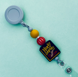 Hurt Comfort Badge Reel Gray