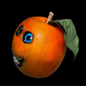 Orange with a face, Halloween, braces, orthodontics, fake, faux, artificial, gag gift, chef gift, citrus, vegan, juicer, orange, spooky, creepy, one of a kind, anthropomorphic