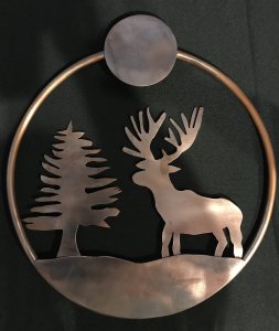 Copper Wall Hanging with the setting of a deer and tree.