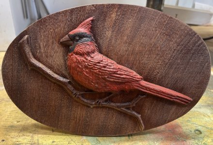 Beautiful Cardinal on a branch, made from Mahogony and hand painted,