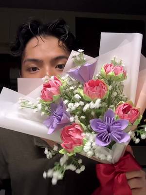 Replying to @kwhid future wife: nak paper bouquet 💐 me: okay jomz!  #fypシ #paperbouquet #paperflower #paperflowerbouquet #foryoupage #howtogetagirl #guaranteedsuccess  go through the steps with me~ [paper bouquet] 🖌️items you will need:  [lotus flower] 6x memo notes (4 for petals, 2 for leafs) [kusuduma flower] 4x memo notes artificial baby breaths glue gun/ liquid strong glue scissors  rubber band cut into 2 or  floral tape  2mm floral wire korean wrapping paper ribbon for bow  ✂️Process:  [Lotus flower] 1) Fold a square piece of paper into a rectangle by folding the bottom edge of the paper to the top edge 2) Unfold the paper 3) Cut into two 4) Fold the paper into half, dog ear each corner into the centre 5) Fold the sides into the centre 6) Fold both sides into half 7) Repeat the steps for the remaining petals and leafs 8) Assemble 1 leaf inside 2 petals (4 sets in total), place them side by side and double secure with a band. Cut off excess 9) Spread them apart nicely and flip the flower 10) Open the petals and leaf as demurely as possible!     [Kusuduma flower] 1) Fold a square piece of paper into a triangle by folding the bottom corner to the top corner 2) Fold the triangle into a diamond by folding the left and right corners to the top  3) Unfold the right side and insert a finger into the pocket of that flap and squash down 4) Repeat for the left side.  5) Fold the left and right corners down and fold both triangles in half 6) Without creasing the paper, bring the left and right sides to face each other and glue them together. Assemble and glue 4 more petals together (Total 5 petals) [Bow] 1) Start by holding the start of the ribbon with your thumb and index fingers 2) Loop the ribbon over the index finger 3 times. 3) Loop over your thumb 3 times as well 4) Loop it across to the left hole, forming a horizontal loop and pull it out 5) Cross that behind the horizontal loop you just created  6) Pull and tighten. Let go off both ribbon ends and fluff up the bows. Flower wrapping:  (First style) https://vt.tiktok.com/ZS2ucfNA6/ 